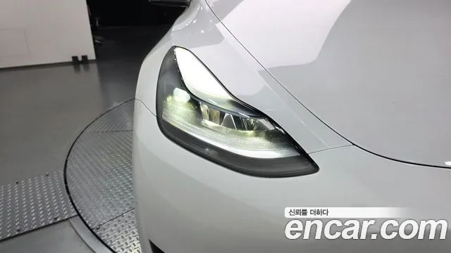 Tesla Model Y — Фото автомобиля 7