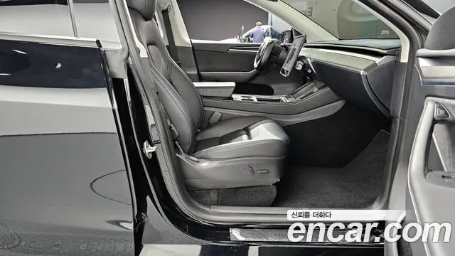 Tesla Model Y — Фото автомобиля 16