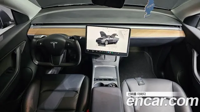 Tesla Model Y — Фото автомобиля 10