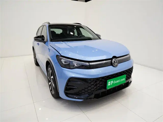Volkswagen Tiguan L — Фото автомобиля 3