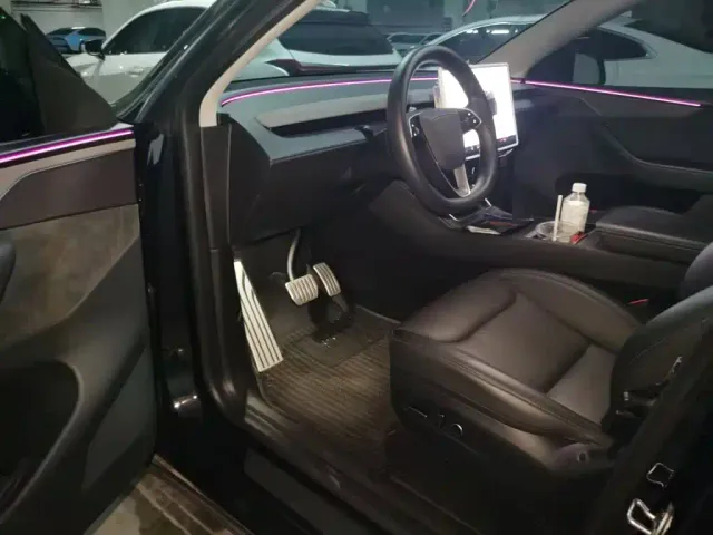 Tesla Model Y — Фото автомобиля 12