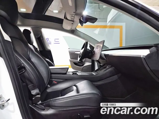 Tesla Model 3 — Фото автомобиля 16