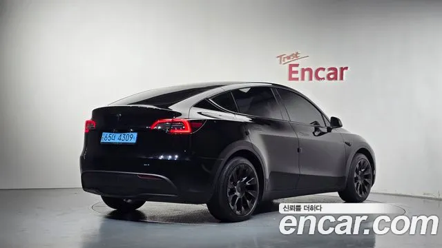 Tesla Model Y — Фото автомобиля 2