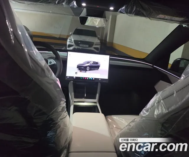 Tesla Model Y — Фото автомобиля 6
