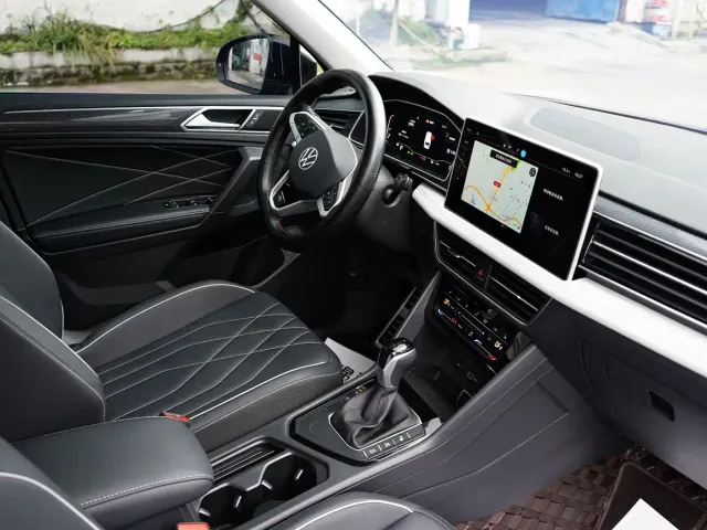 Volkswagen Tiguan L — Фото автомобиля 10