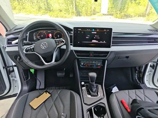 Volkswagen Tiguan L — Фото автомобиля 9