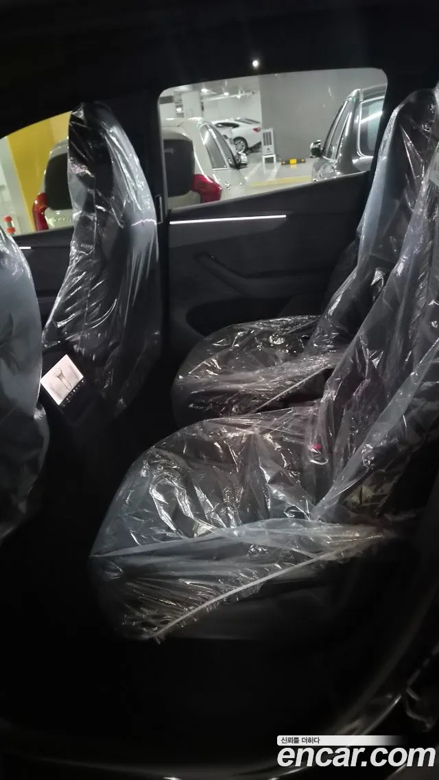 Tesla Model Y — Фото автомобиля 5