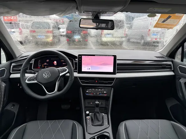 Volkswagen Tiguan L — Фото автомобиля 5