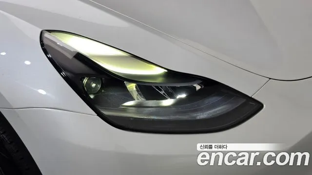 Tesla Model Y — Фото автомобиля 18