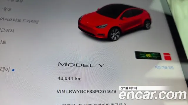 Tesla Model Y — Фото автомобиля 11