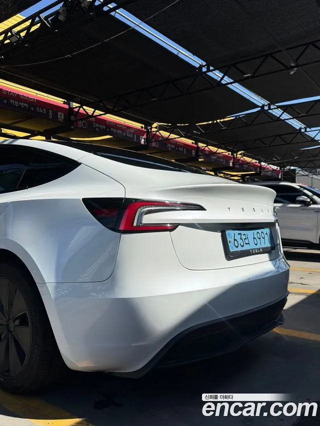 Tesla Model 3 — Фото автомобиля 16