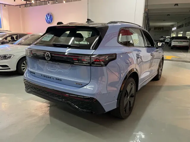 Volkswagen Tiguan L — Фото автомобиля 11