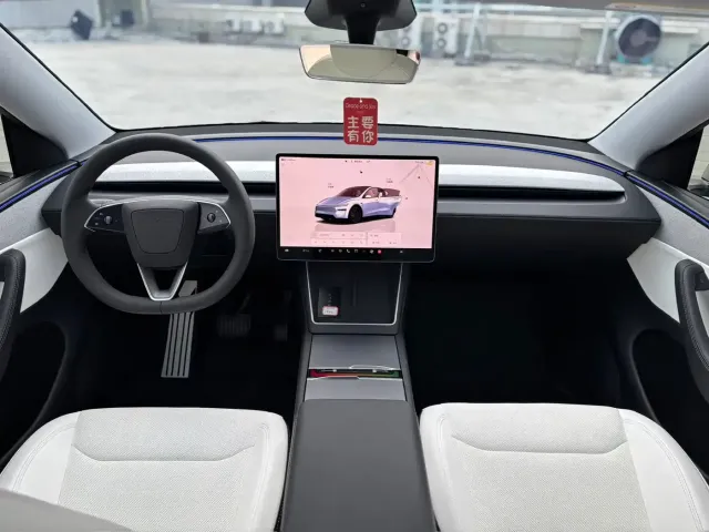 Tesla Model Y — Фото автомобиля 5