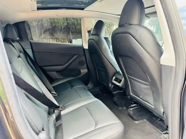 Tesla Model Y — Фото автомобиля 10