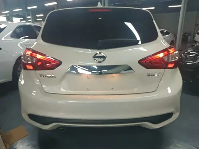 Nissan Tiida — Фото автомобиля 5