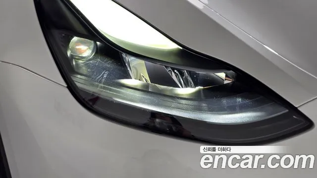 Tesla Model Y — Фото автомобиля 7