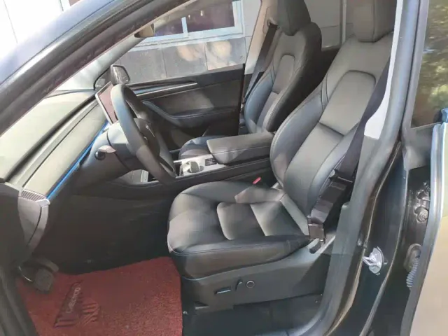 Tesla Model Y — Фото автомобиля 14