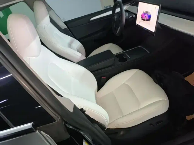 Tesla Model Y — Фото автомобиля 24