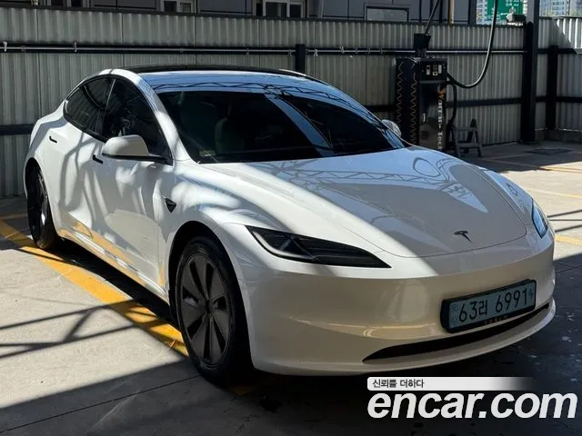 Tesla Model 3 — Фото автомобиля 3