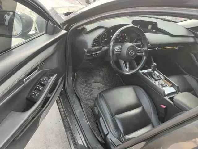 Mazda Axela — Фото автомобиля 15