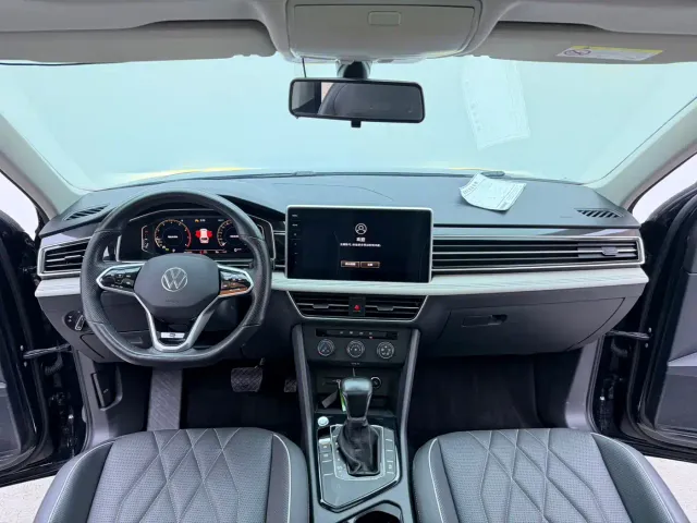 Volkswagen Tiguan L — Фото автомобиля 11