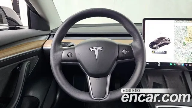 Tesla Model 3 — Фото автомобиля 13