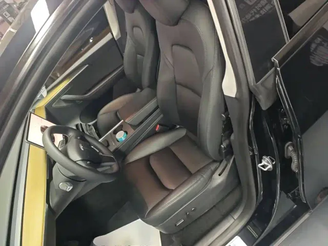 Tesla Model Y — Фото автомобиля 14
