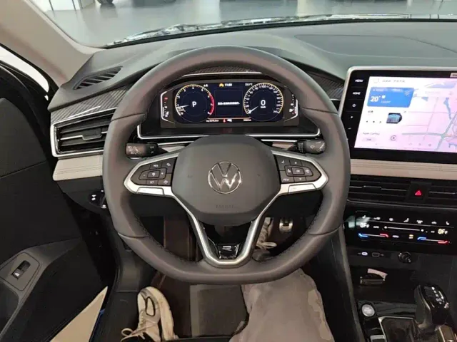 Volkswagen Tiguan L — Фото автомобиля 10