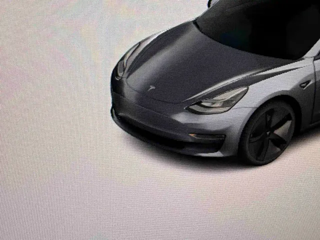 Tesla Model 3 — Фото автомобиля 10