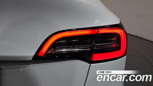 Tesla Model Y — Фото автомобиля 7
