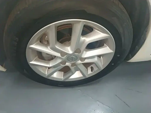 Nissan Tiida — Фото автомобиля 22