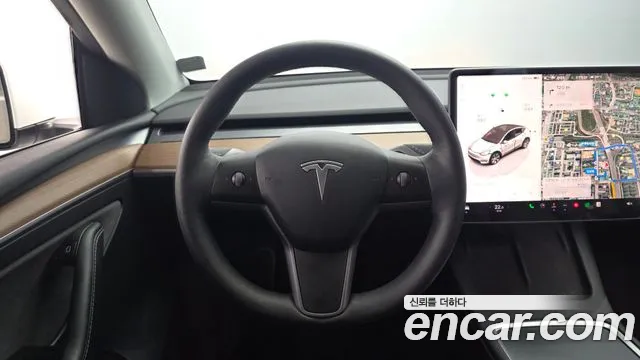 Tesla Model Y — Фото автомобиля 11