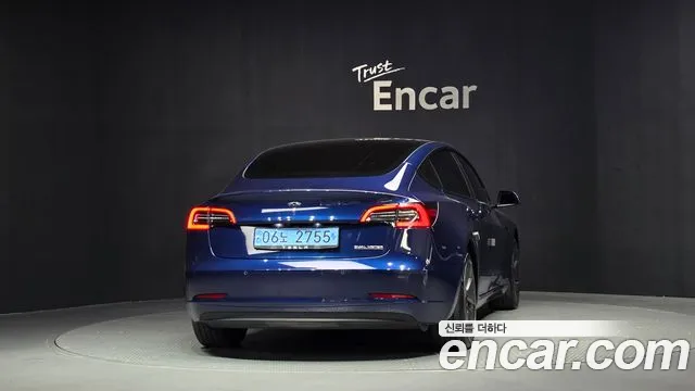 Tesla Model 3 — Фото автомобиля 4