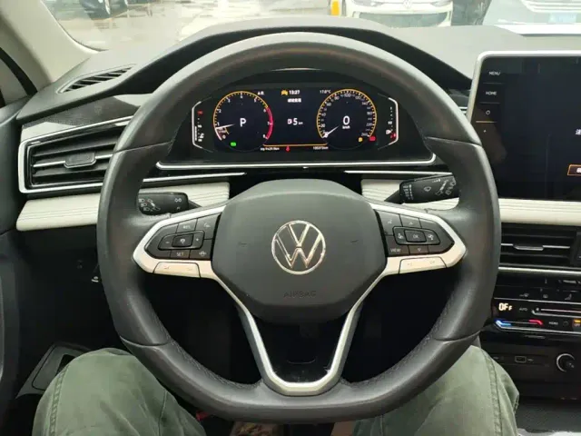 Volkswagen Tiguan L — Фото автомобиля 10