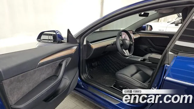 Tesla Model 3 — Фото автомобиля 7