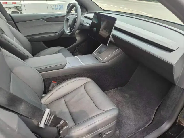 Tesla Model Y — Фото автомобиля 6