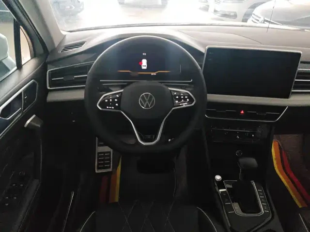 Volkswagen Tiguan L — Фото автомобиля 6