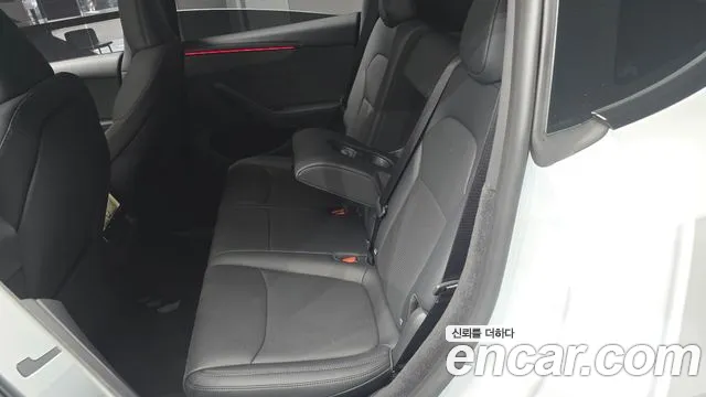 Tesla Model Y — Фото автомобиля 18