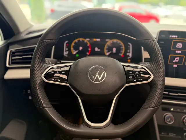 Volkswagen Tiguan L — Фото автомобиля 9