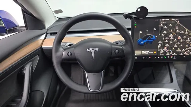 Tesla Model 3 — Фото автомобиля 20