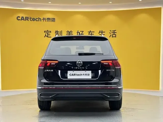 Volkswagen Tiguan L — Фото автомобиля 5