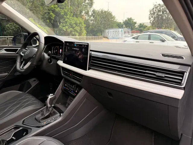 Volkswagen Tiguan L — Фото автомобиля 11