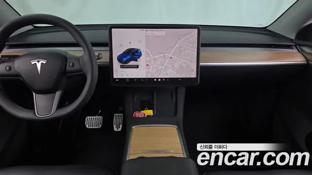 Tesla Model Y — Фото автомобиля 14