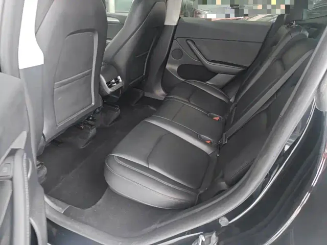 Tesla Model Y — Фото автомобиля 12