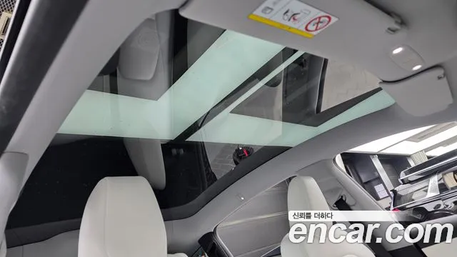 Tesla Model Y — Фото автомобиля 17