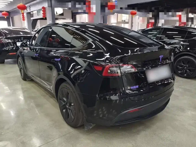 Tesla Model Y — Фото автомобиля 4