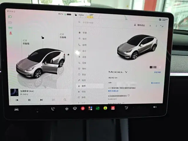 Tesla Model Y — Фото автомобиля 11