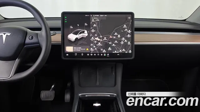 Tesla Model Y — Фото автомобиля 14