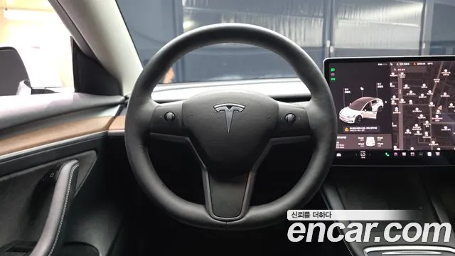 Tesla Model 3 — Фото автомобиля 13