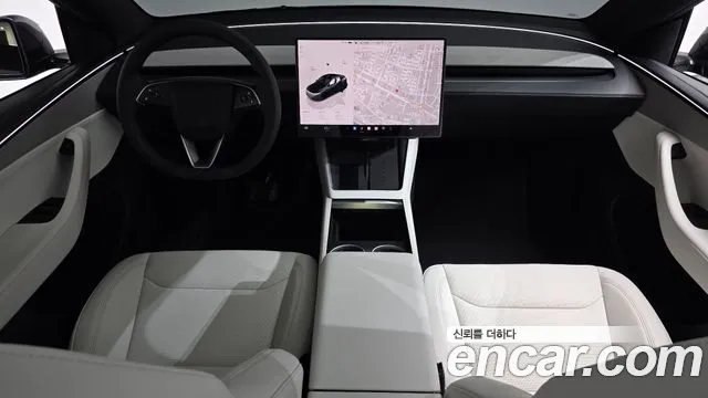 Tesla Model Y — Фото автомобиля 10